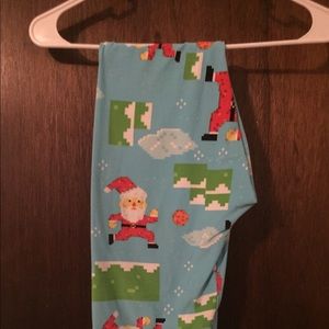 OS LEGGINGS SANTA MARIO BRO. $50